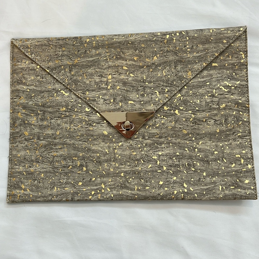 Gold trim envelope style clutch